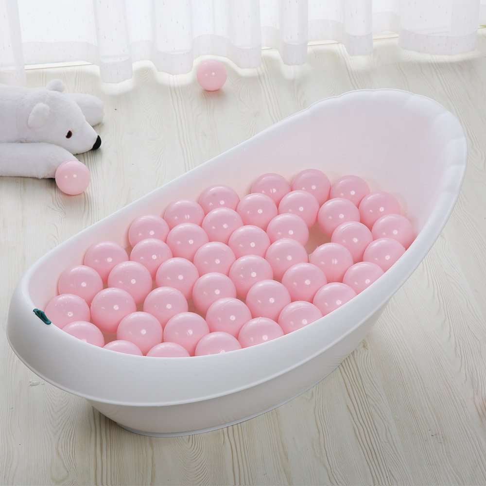 PlayMaty ball pit setup with pink balls in a home play area.