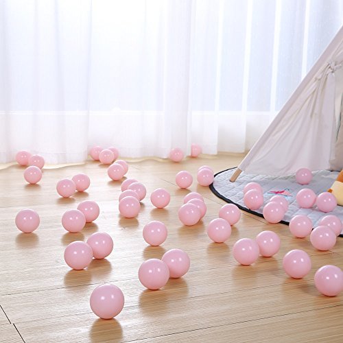 PlayMaty display-ready pink balls shown in a store layout.