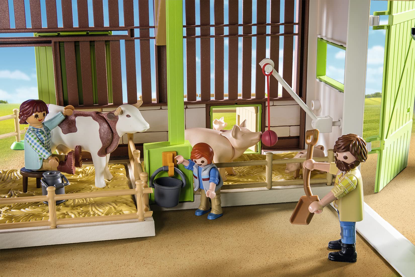 Tractor connected to the electric charging station on Playmobil Large Farm