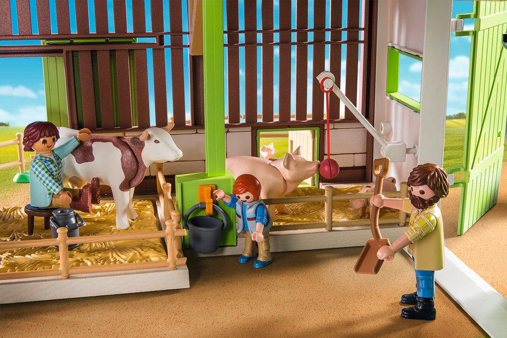 Tractor connected to the electric charging station on Playmobil Large Farm