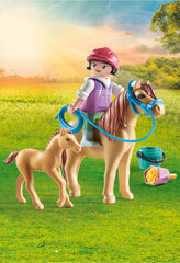 Playmobil pony and foal care scene promotes nurturing play.