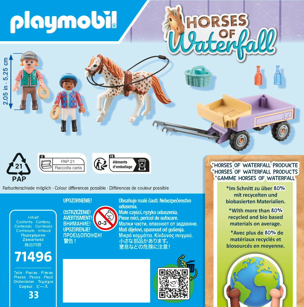 Two kids enjoy a pony ride on the carriage