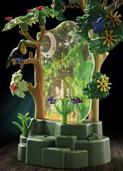 Playmobil Wiltopia acrylic plates illuminate two cozy rainforest scenes.