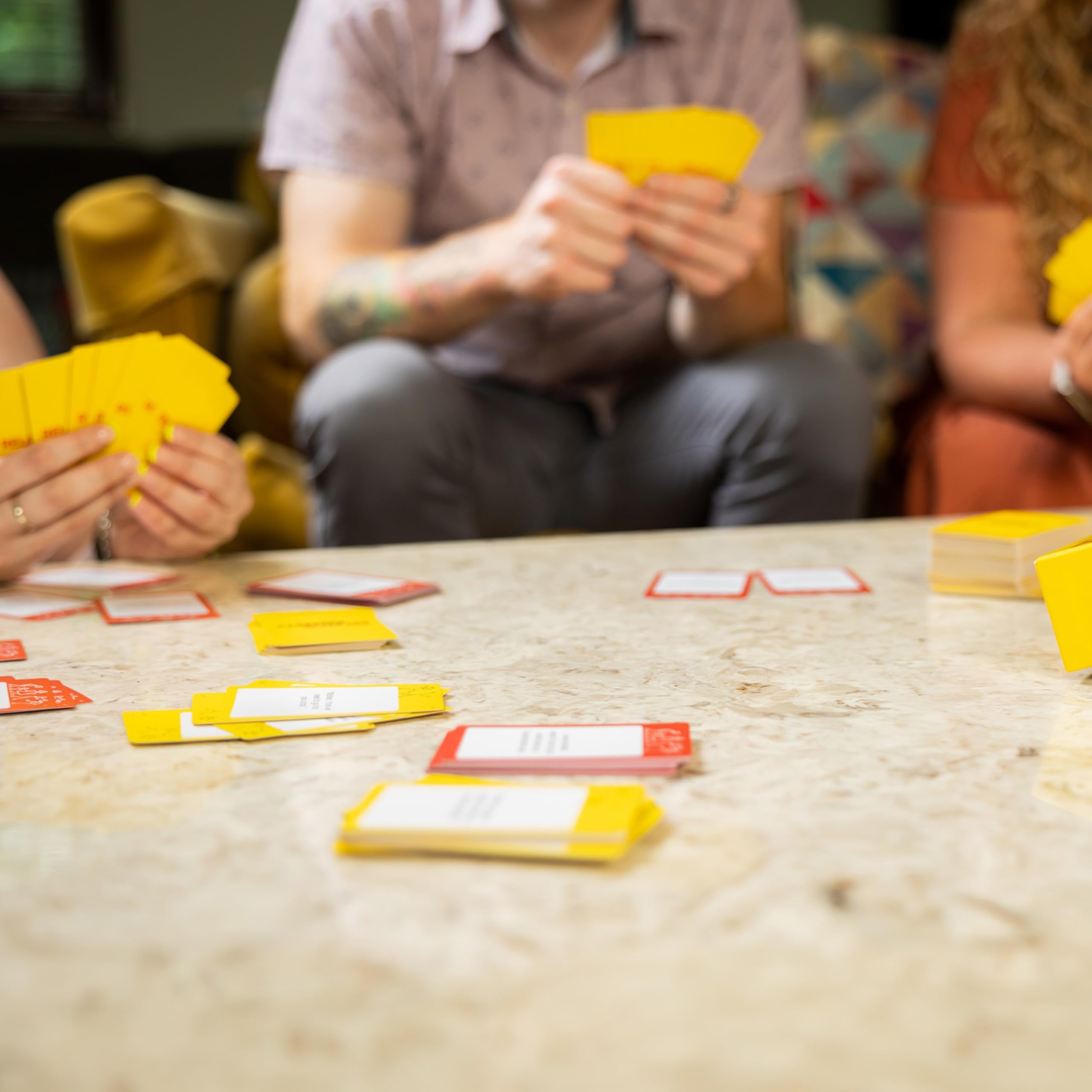 Eight-player living room scene showcasing a dynamic party game moment