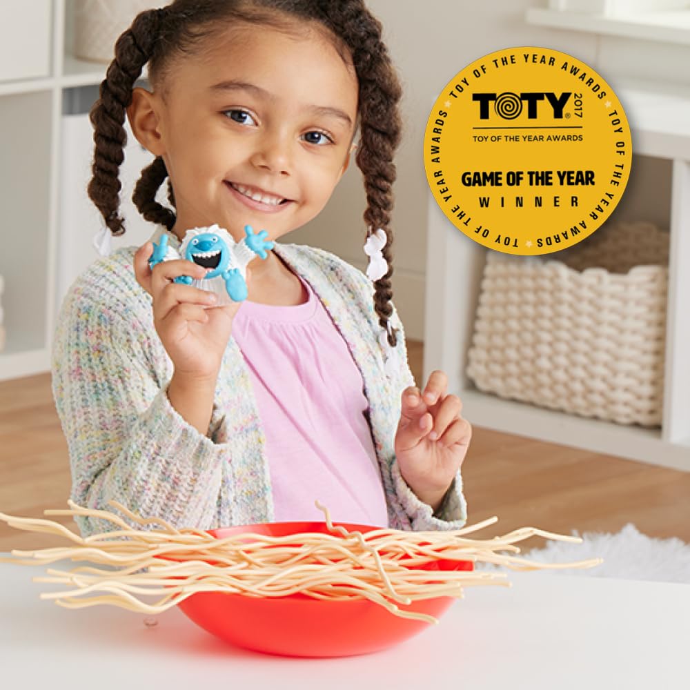 PlayMonster Yeti in My Spaghetti family night scene, appeals to kids and caregivers.