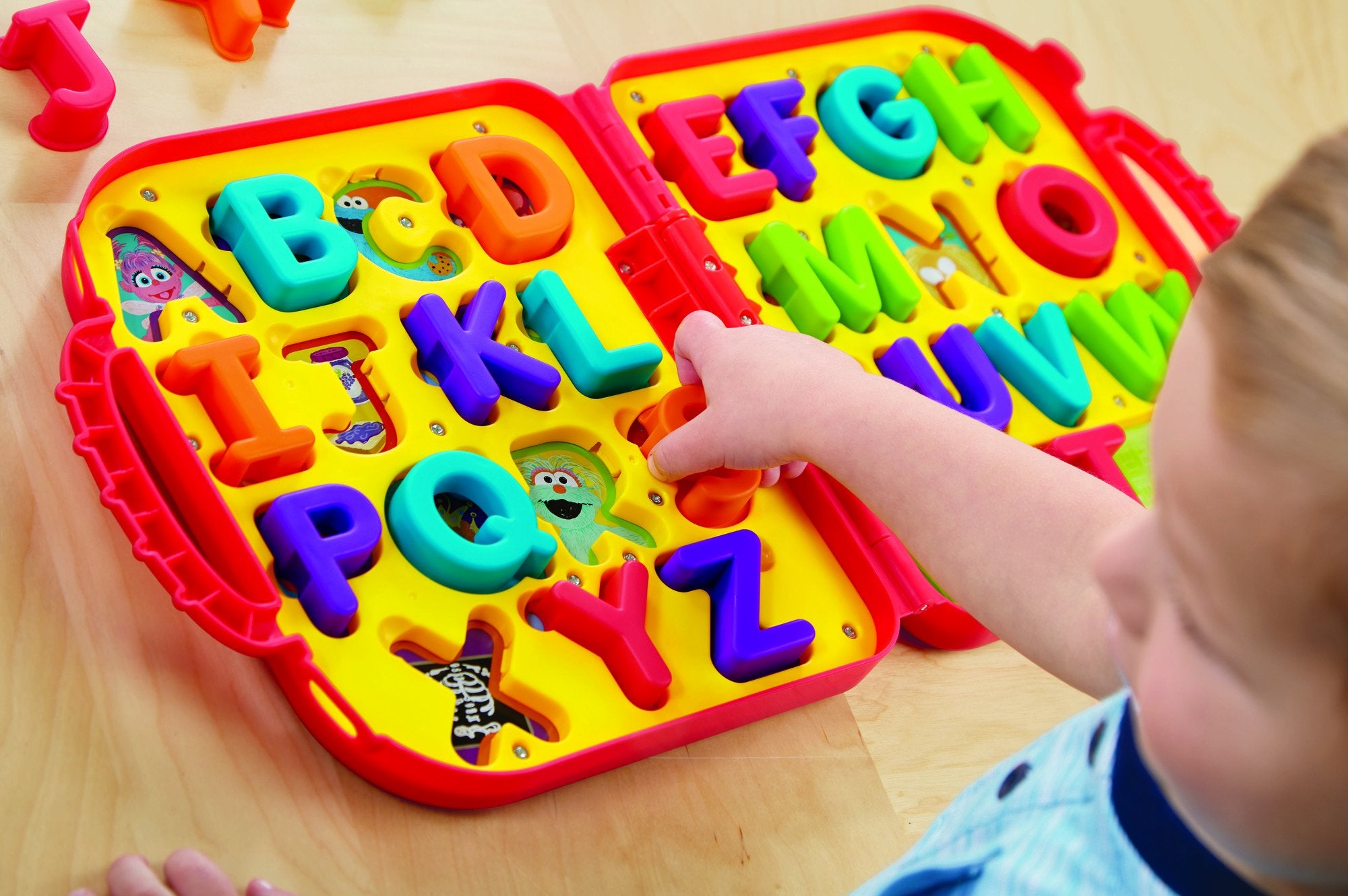 Playskool Elmo's On the Go Letters colorfully chunky letters invite exploration.