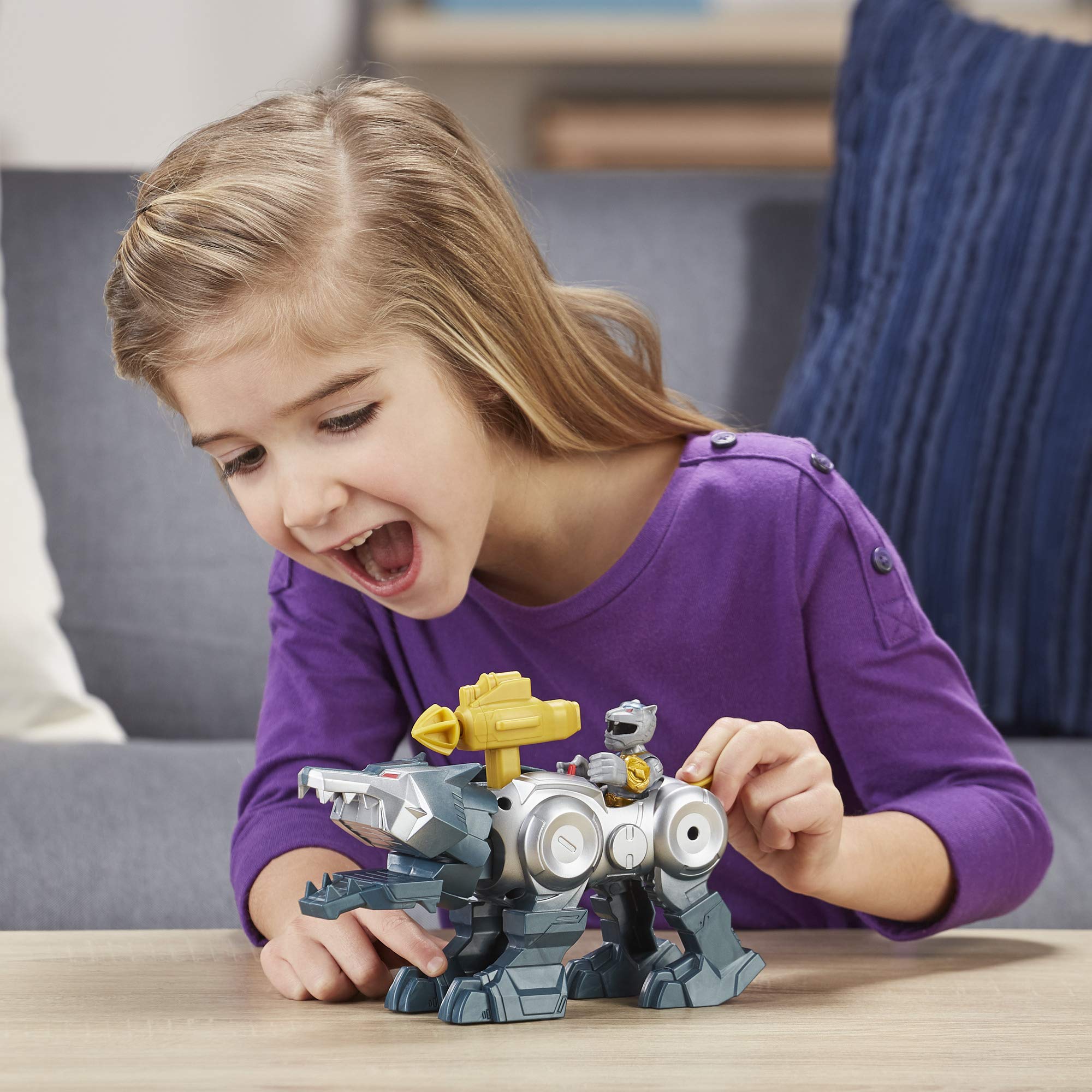 PlaySkool Wolf Zord tail chomp action for dynamic play.