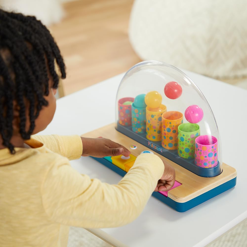 Playskool Little Wonders Pop-A-Tune ball pop-dome creates interactive action for curious toddlers.
