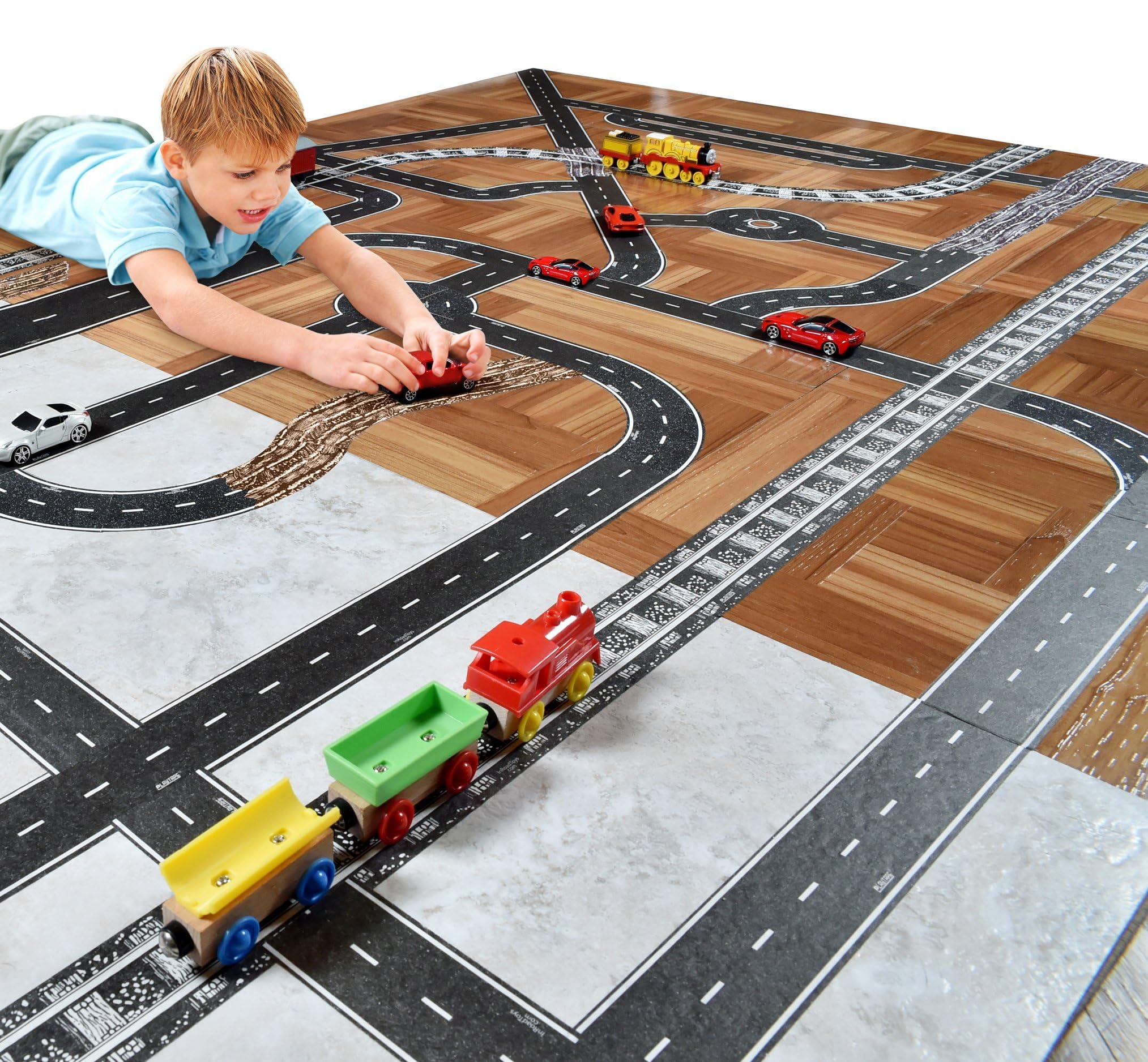 PlayTape supports open-ended play with a tabletop road layout.
