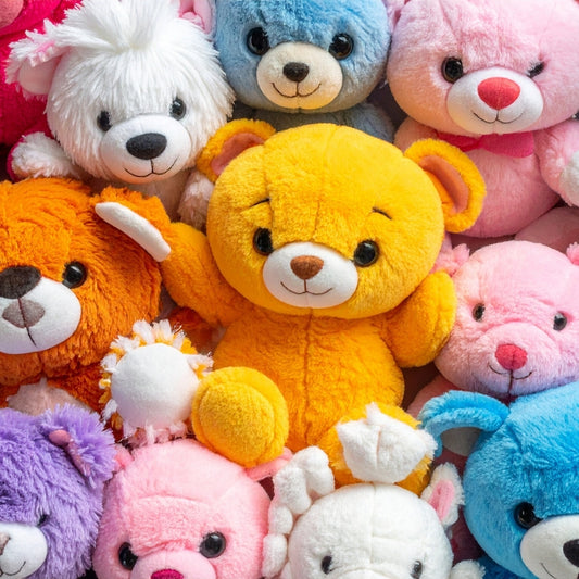 Colorful teddy bears of various sizes and colors.