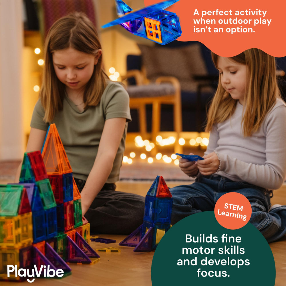 Kids assembling colorful PLAYVIBE tiles into a multi-piece structure