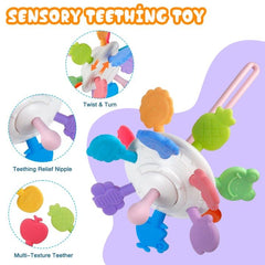 Plunack pull string teether promotes chewing and exploration on the go