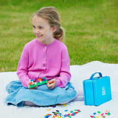 PLUS PLUS guide book helps beginners learn simple builds and ideas.