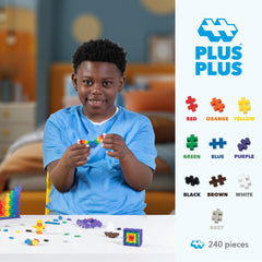 PLUS PLUS bricks connect in a colorful mosaic for creative exploration