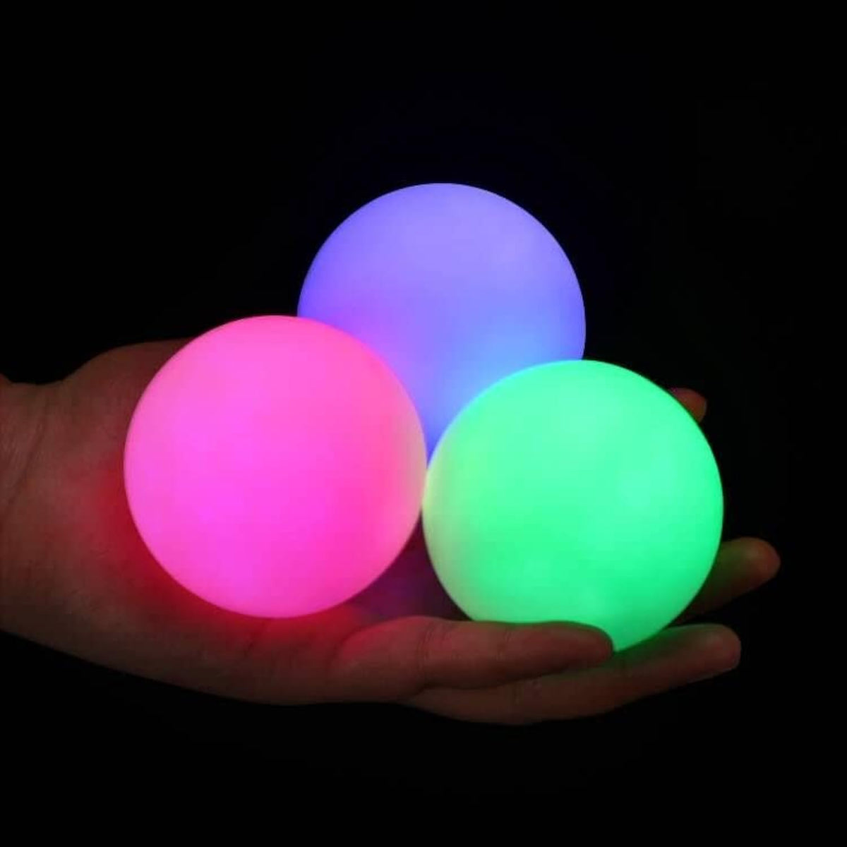 POITOI glow juggling ball set lights up for night practice.