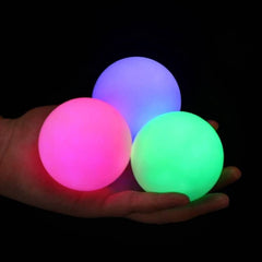 POITOI glow juggling ball set lights up for night practice.