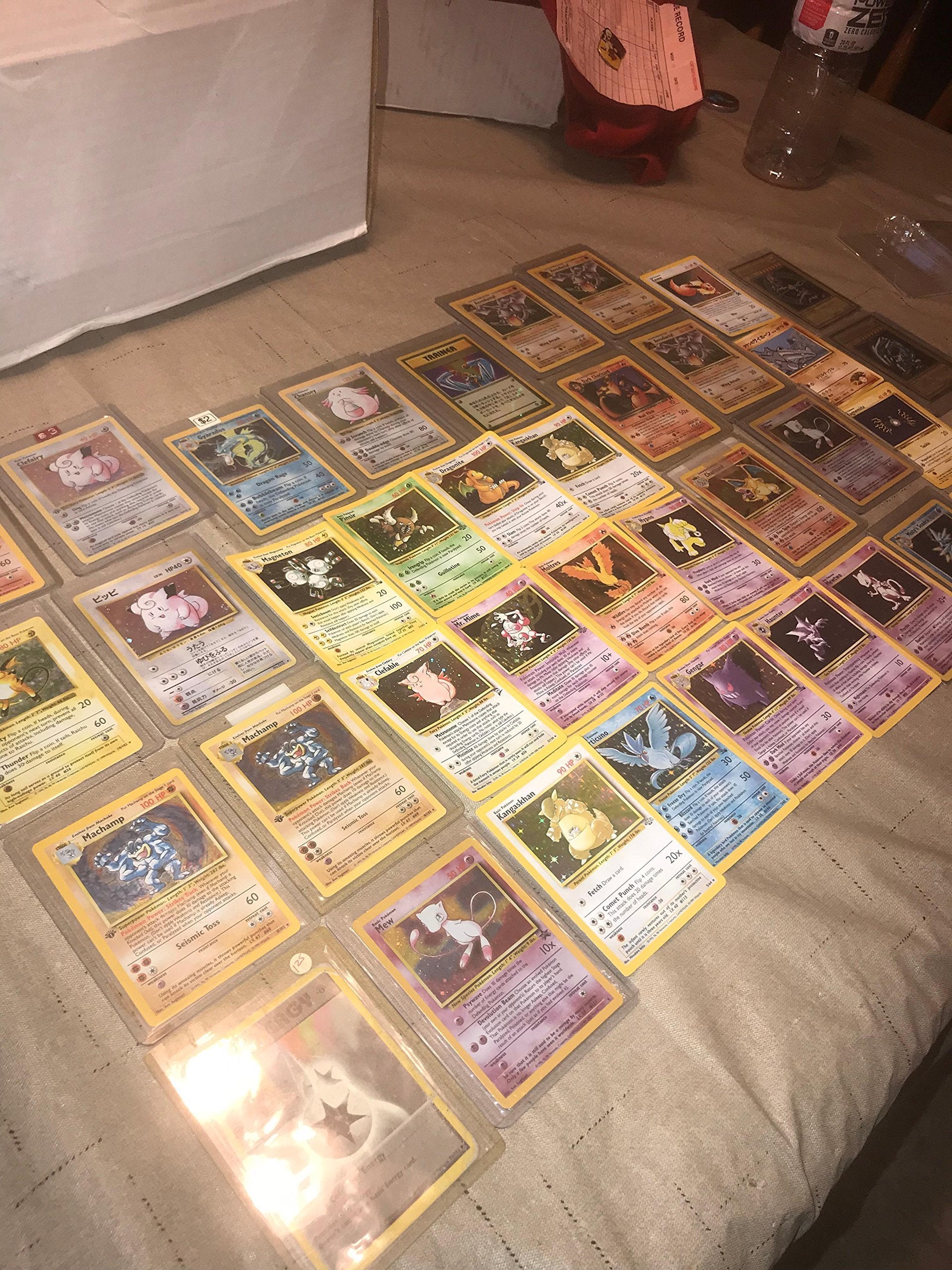 Pokémon 50-card pack with holo display and collection value