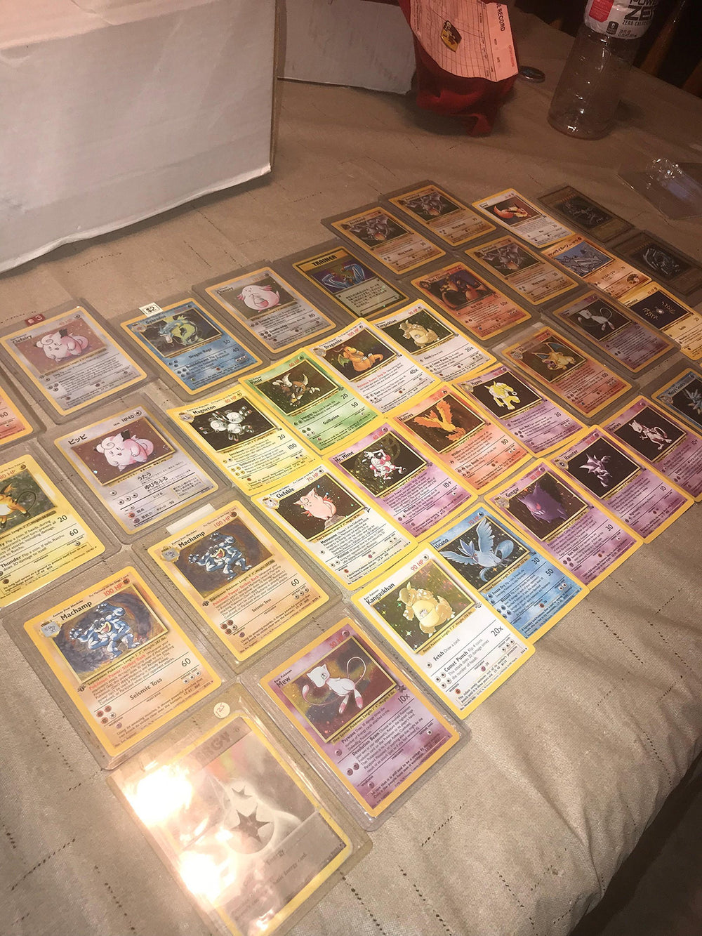 Pokémon 50-card pack with holo display and collection value