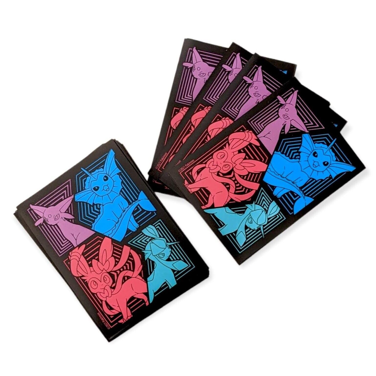 Pokemon card sleeves featuring Sylveon, Espeon, and Glaceon protect standard-size cards during play
