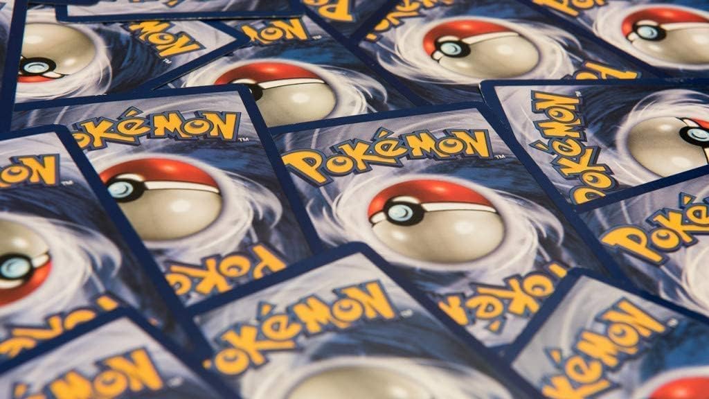 Pokemon cards assorted no-duplicates lot laid out for easy browsing.
