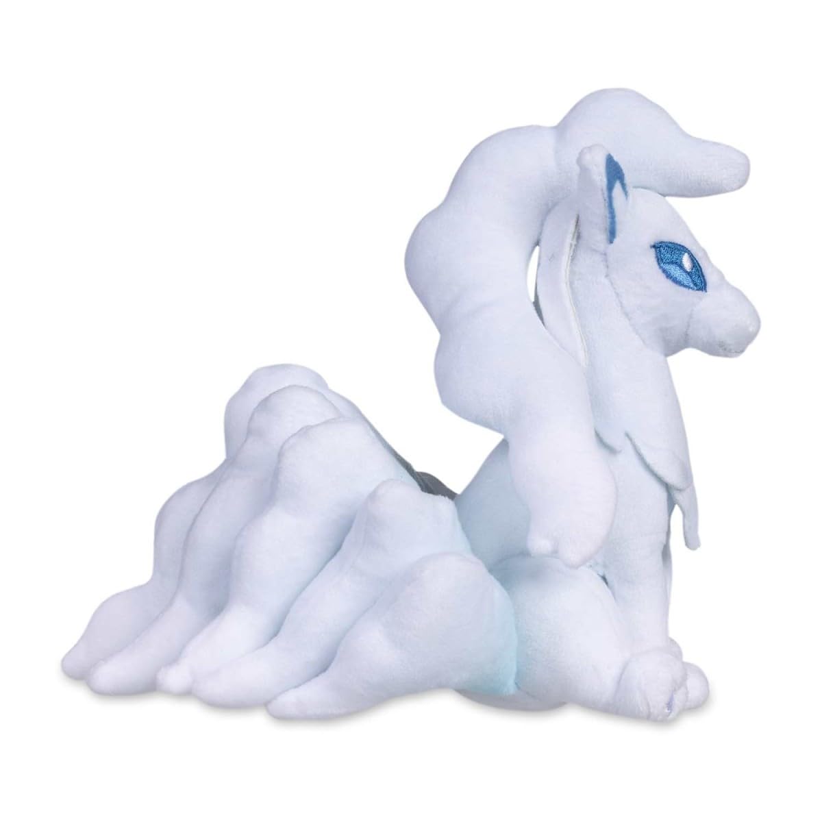 Close-up of plush texture and microbead weight supporting upright pose.