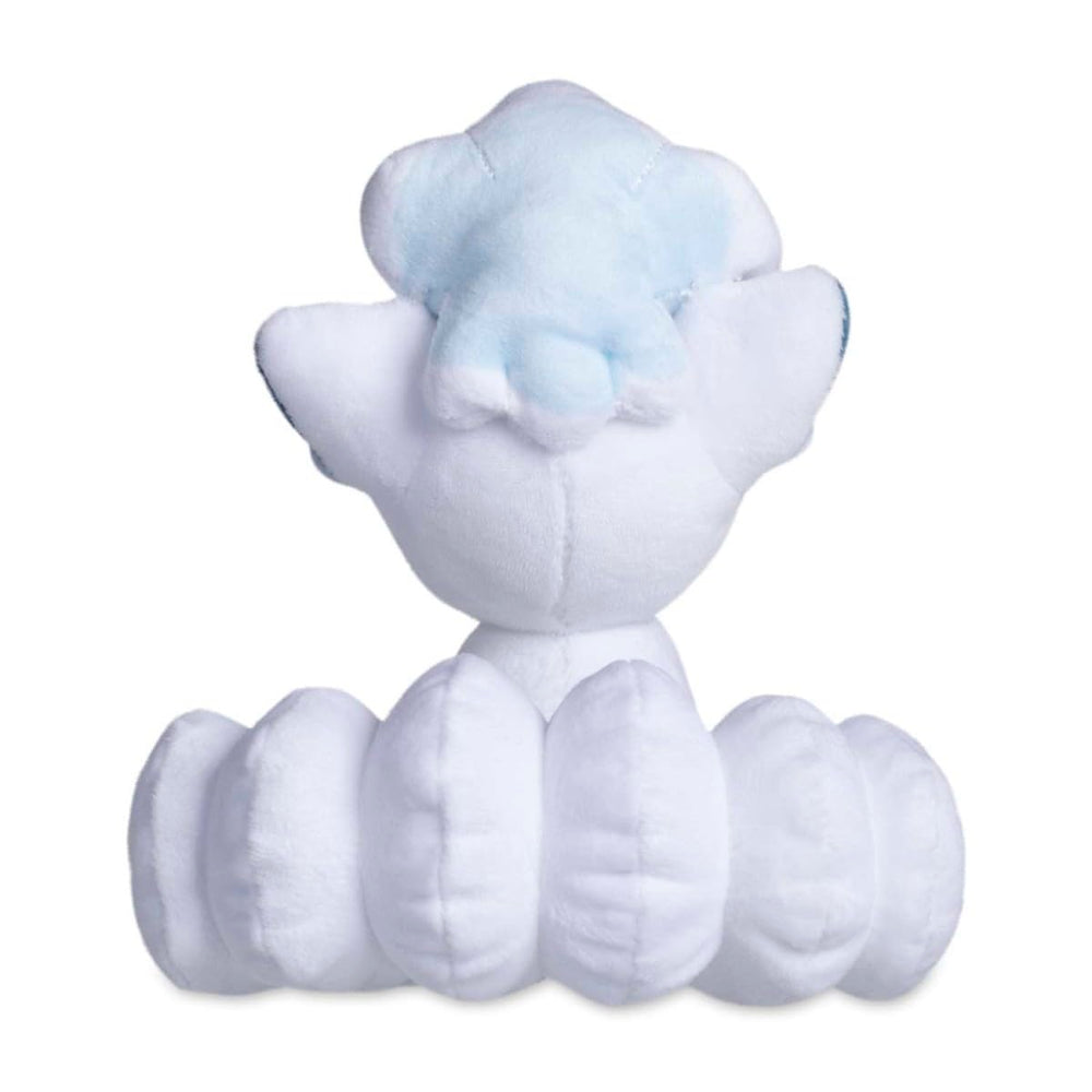 Pokémon Center Alolan Vulpix plush care instructions indicating surface wash only.
