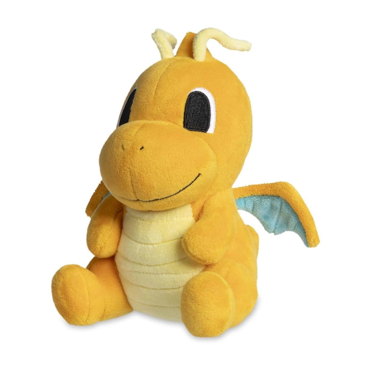 Pokémon Center Dragonite Dolls Plush on a desk, soft fabric for cosy display.