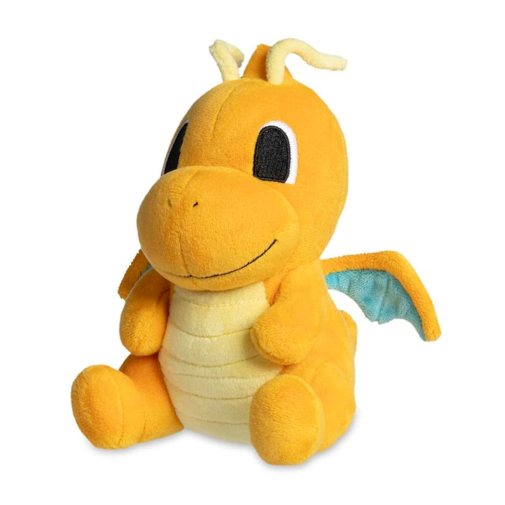 Pokémon Center Dragonite Dolls Plush on a desk, soft fabric for cosy display.