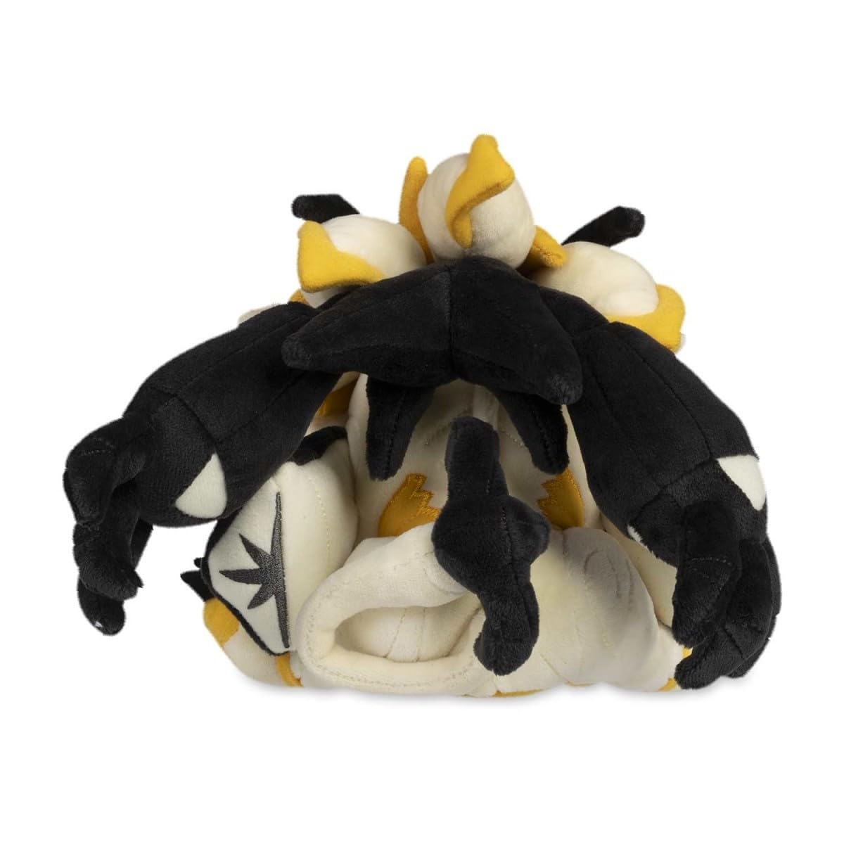 Pokémon Center Dusk Mane Necrozma plush on desk, lightweight display piece.