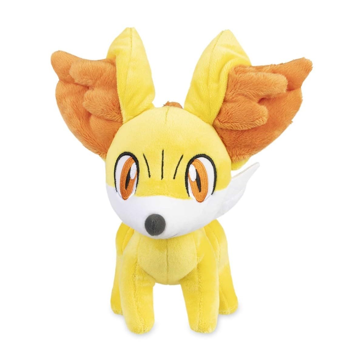 Pokemon Center Fennekin plush shows big floppy ears for cuddly comfort.