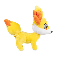 Pokemon Center Fennekin plush embroidery and soft fabric enhance its charm.