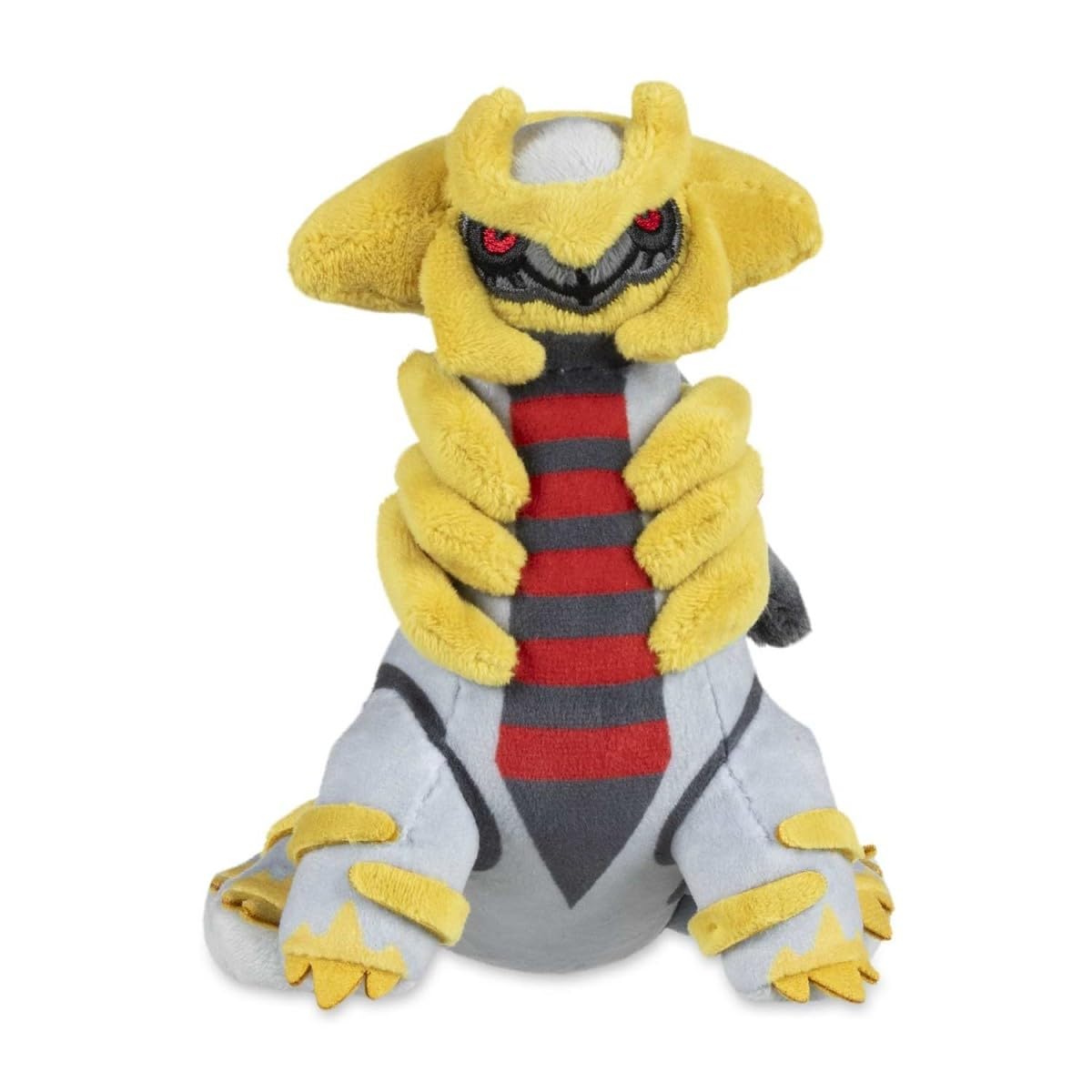 Pokémon Center Giratina Altered Forme Plush on desk shows adorable pose for shelf decor.