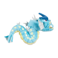 Pokémon Center Gyarados Plush on desk adds charm and collectibility to a space.