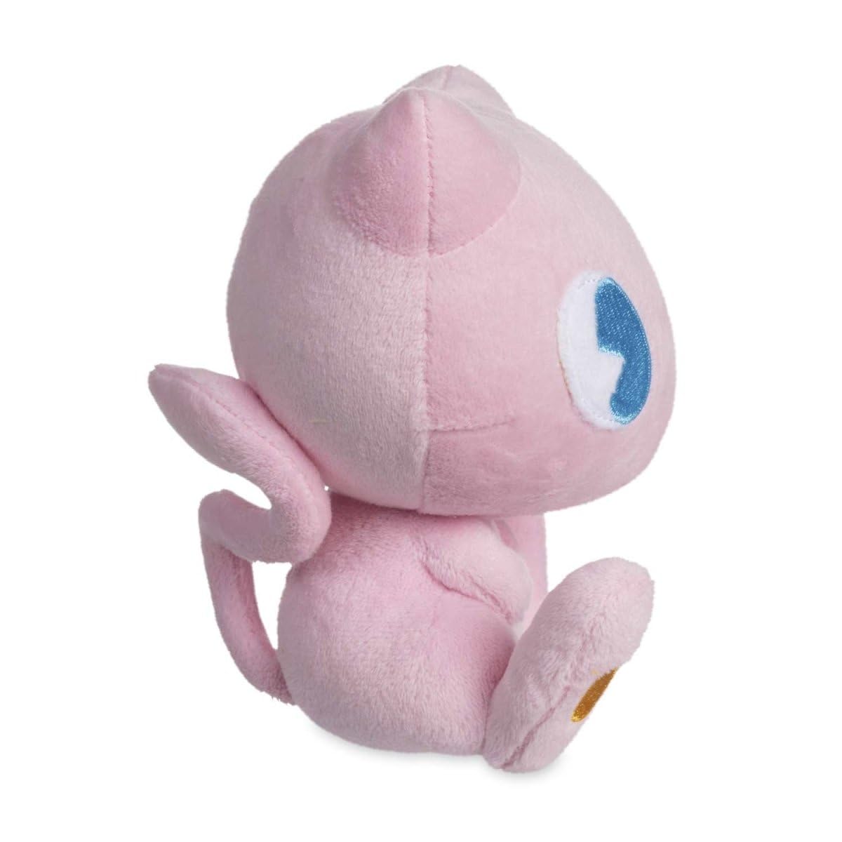 Pokemon Center Mew Soda Pop Plush close-up eyes emphasize nostalgic embroidery and whimsy on display.
