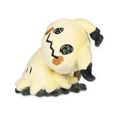 Pokemon Center Mimikyu Busted Form Sitting Cuties Plush sits upright for desk decor and playful display.