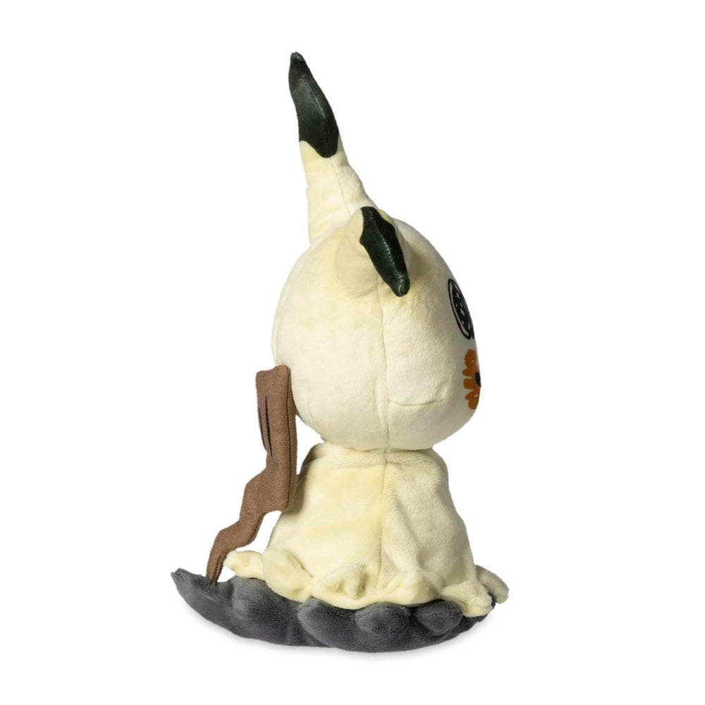 Close-up of embroidered features on Mimikyu plush highlighting craftsmanship.