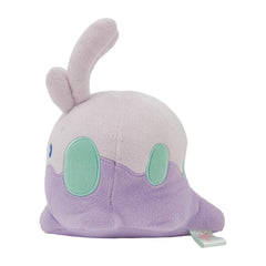 Close-up face detail of Pokemon Center Goomy plush featuring expressive eyes.