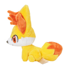 Close-up of Fennekin plush texture from Pokémon Center shows soft fabric.
