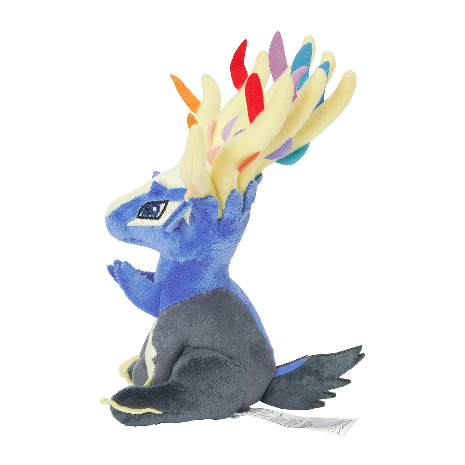 Pokémon fit Xerneas plush on a desk, ideal for playful desk decor