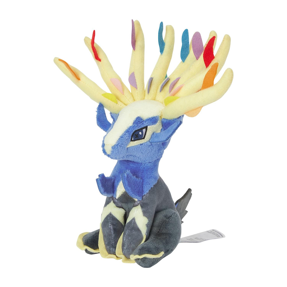 Pokémon fit Xerneas plush front view, weighted to sit up on a desk