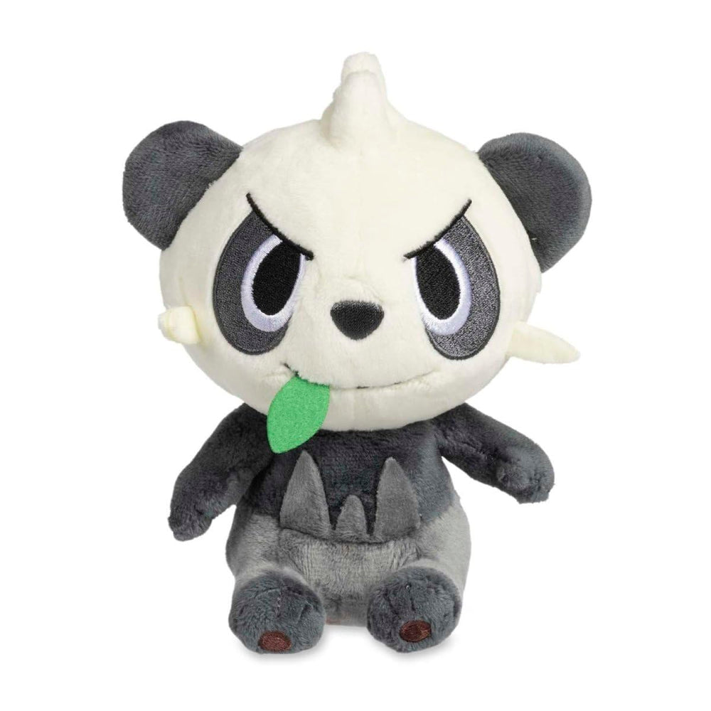 Pokemon Center Pancham plush resting on a shelf as a soft desk companion