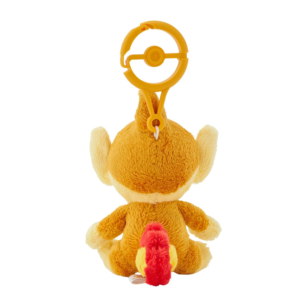 Pokemon Center Chimchar plush close-up, showcasing soft texture and stitched details as a travel buddy.