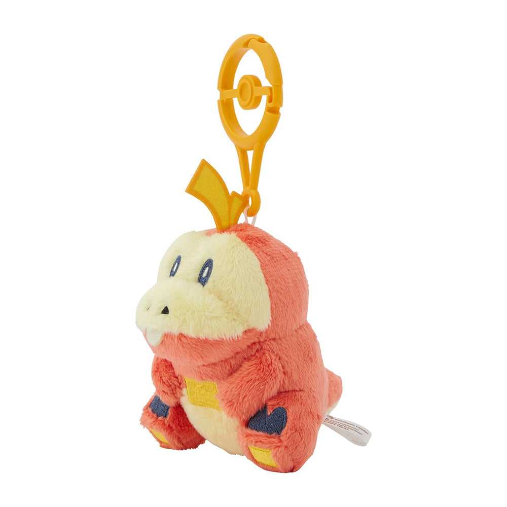 Fuecoco plush viewed from side with carabiner, ideal backpack decor and attachment.