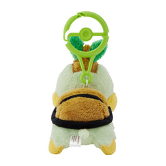 Pokémon Center Turtwig plush attached to bag for easy travel.