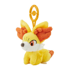 Pokemon Center Fennekin plush close-up shows soft fur and stitching.
