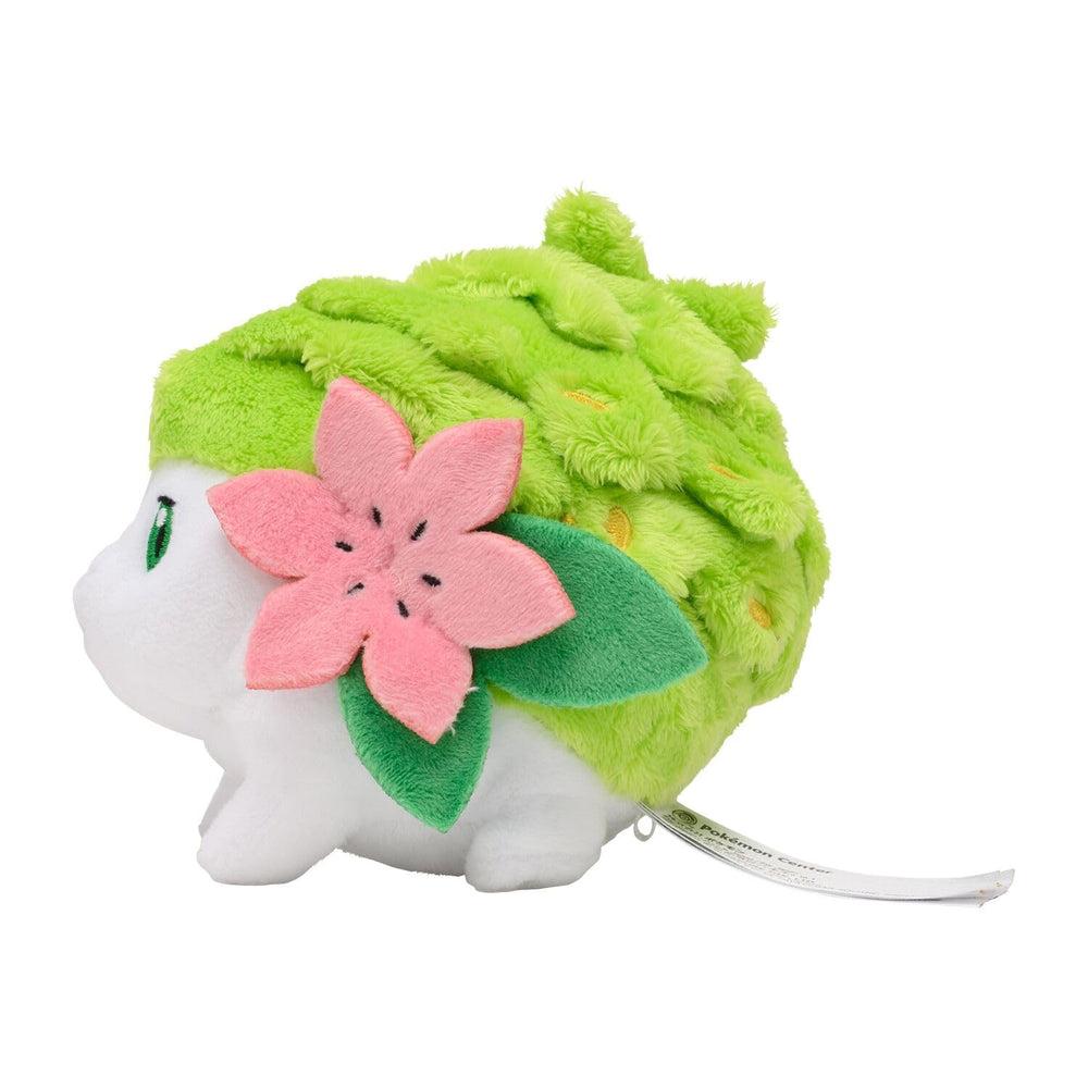 Pokemon Center Shaymin Land Plush 492 side view, ideal for shelf display and gifting.