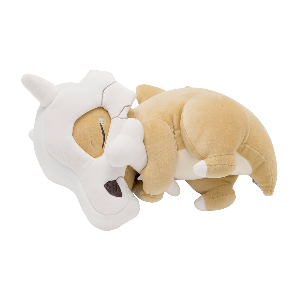Pokémon Center Sleep Goodnight Cubone Plush on bed showing compact size for night-time companionship.