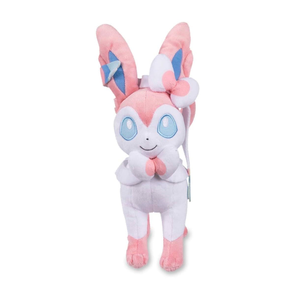 Pokemon Center Sylveon plush side view shows its 11 inch height and bright blue eyes