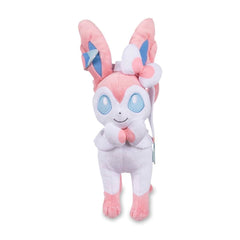 Pokemon Center Sylveon plush side view shows its 11 inch height and bright blue eyes