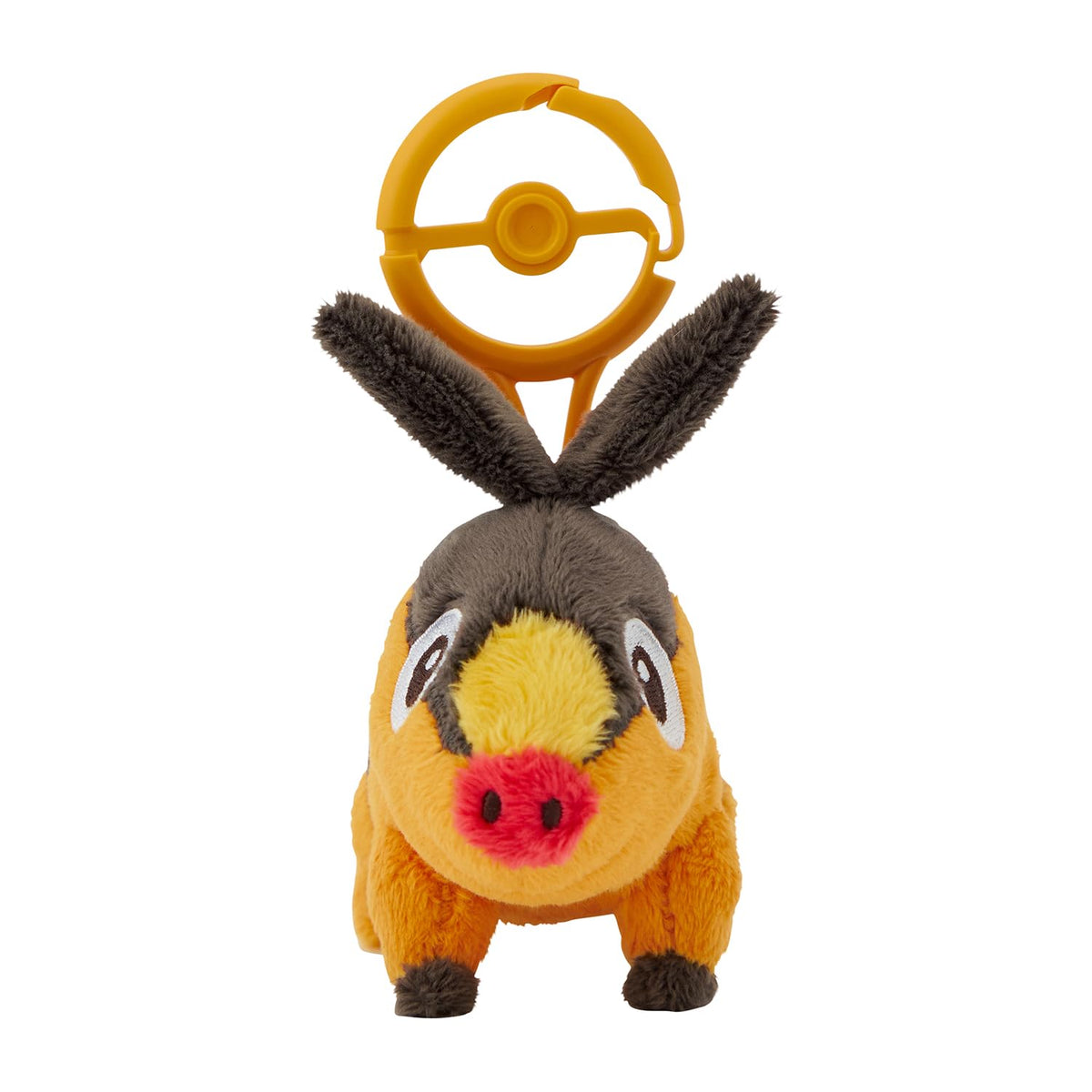 Pokémon Tepig plush with carabiner close-up showing soft texture and clip.